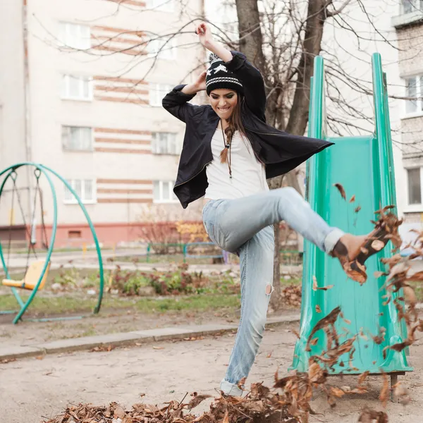 Gentle portrait of a beautiful girl on a swing — Stock Photo, Image