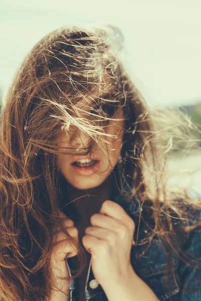 Hipster girl with windy hair — Stok fotoğraf