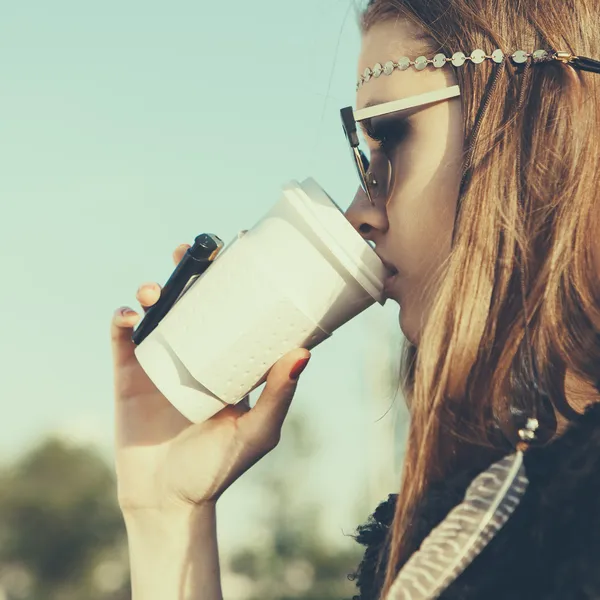 Beautiful hipster woman with cup of coffee — Stock Photo, Image