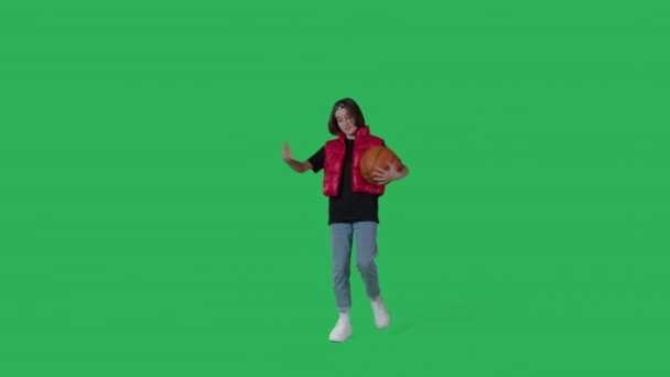 Young beautiful girl dancing over green screen — Wideo stockowe