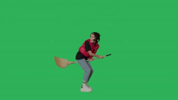 Cute Witch Flying on the green screen — Stock Video