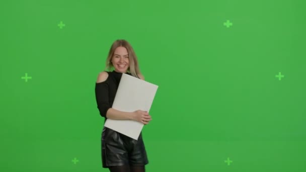 Girl holding large paper poster Valentines Day — стоковое видео