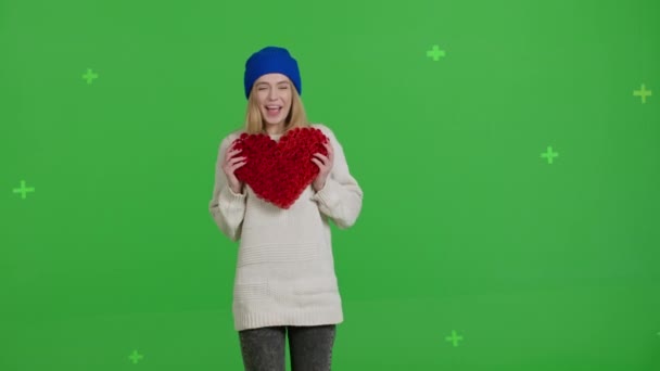 Girl with hand-made paper heart in her hands — Αρχείο Βίντεο