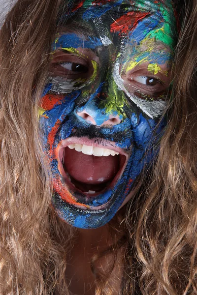 Jovem mulher com face-art — Fotografia de Stock