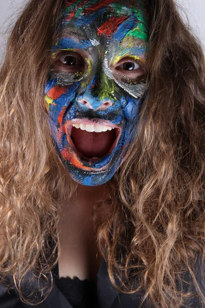 Jovem mulher com face-art — Fotografia de Stock