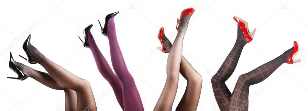 Woman's Legs Wearing Pantyhose and High Heels Isolated Against a White Studio Background