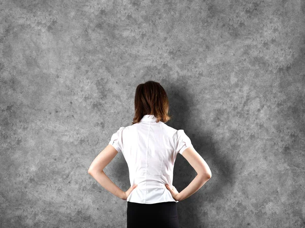 Standing beautiful brunette backside — Stock Photo, Image