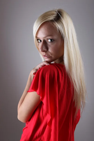 Girl in a red dress — Stock Photo, Image