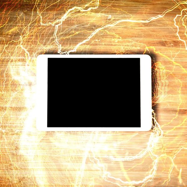 Tablet concept with lightnings — Stock Photo, Image