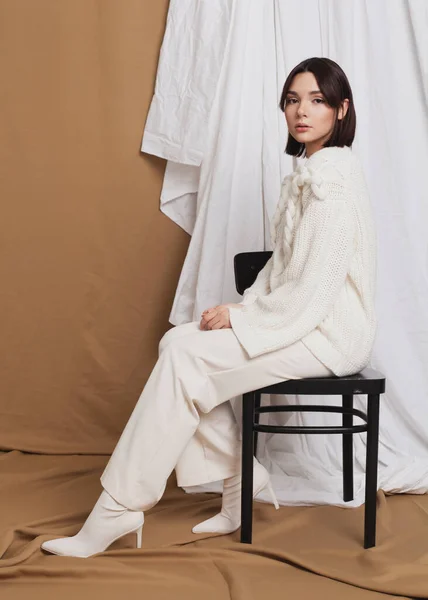 Beautiful Girl Light Warm Clothes Sits Chair — Stok fotoğraf