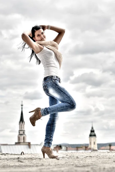 Beautiful young woman with black, long hair — Stock Photo, Image