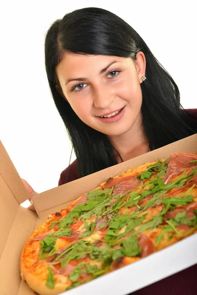 Portret van een jonge vrouw een pizza eten op een witte achtergrond — Stockfoto