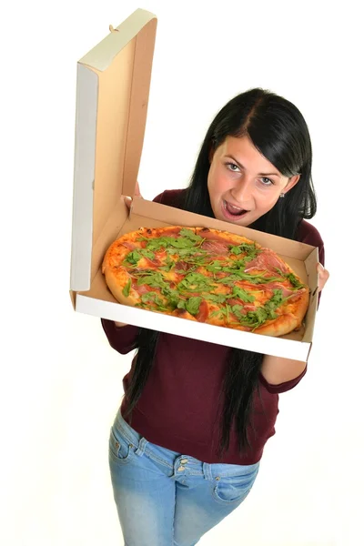 Portret van een jonge vrouw een pizza eten op een witte achtergrond — Stockfoto