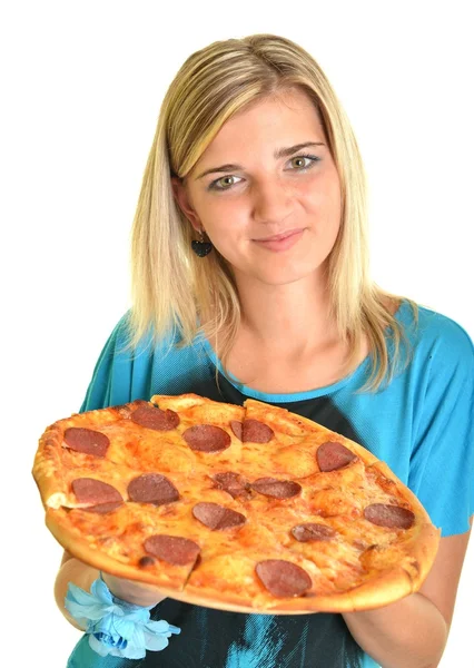 Retrato de una joven comiendo una pizza sobre un fondo blanco — Foto de Stock