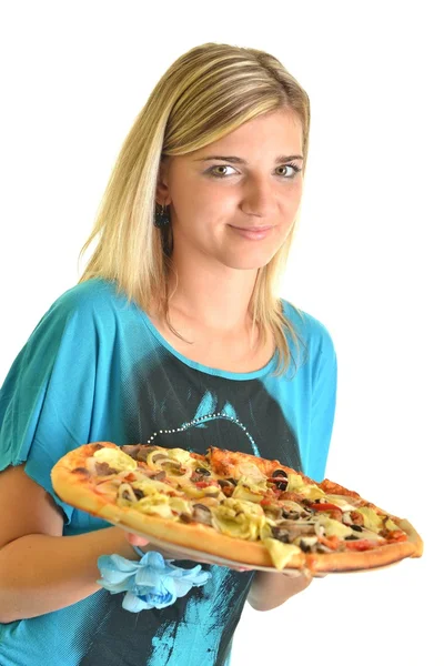 Junge Frau isst ein Stück Pizza vor weißem Hintergrund — Stockfoto