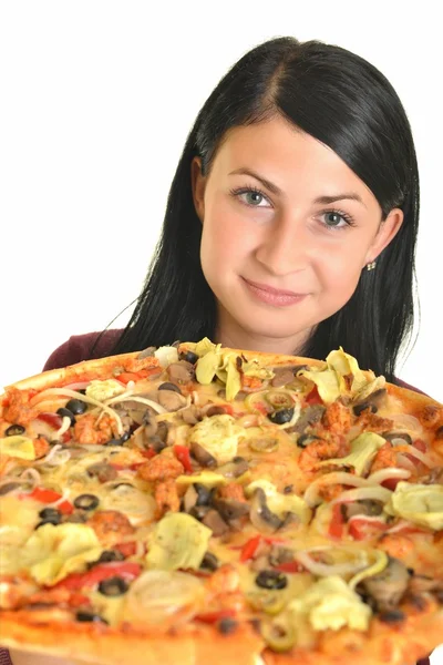 Vacker flicka äter pizza till lunch isolerad på vit — Stockfoto