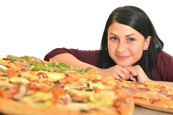 Genç kadın bir parça pizza beyaz bir arka plan beslenme Stok Resim