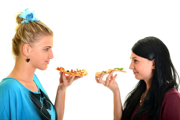 Smukke piger spiser pizza til frokost - Stock-foto