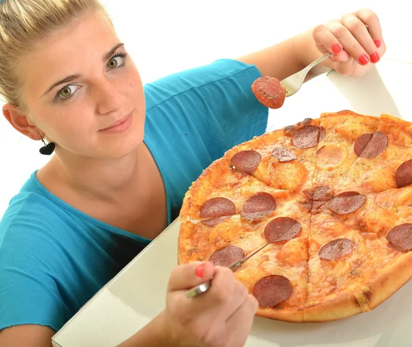 Sexy girl eating pizza Stock Photo