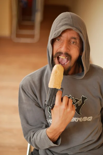 Gangster eating roll — Stock Photo, Image