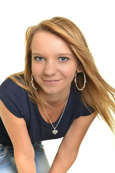 Portrait of young woman against a white background — Stock Photo, Image