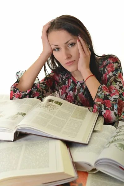 Giovane donna con libri, isolata su bianco — Foto Stock