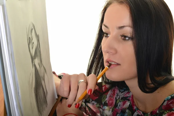 Woman painting with pencil on canvas for fun at home — Stock Photo, Image