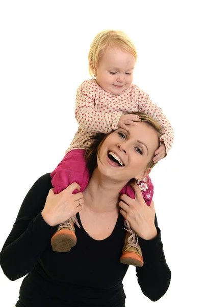 Portrait of a happy mother hugging her daughter, isolated over white — Stock Photo, Image