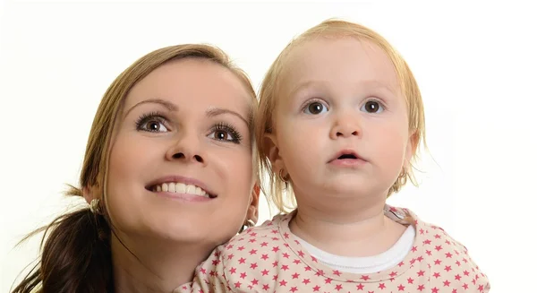 Portrait of a happy mother hugging her daughter, isolated over white — Stock Photo, Image