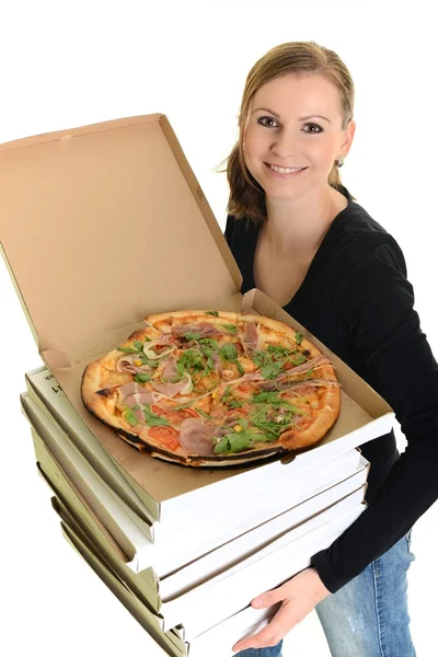 Portret van een jonge vrouw een pizza eten op een witte achtergrond — Stockfoto