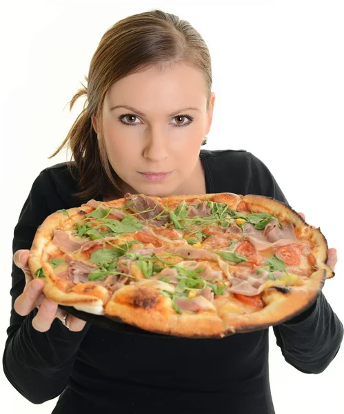 Portret van een jonge vrouw een pizza eten op een witte achtergrond — Stockfoto