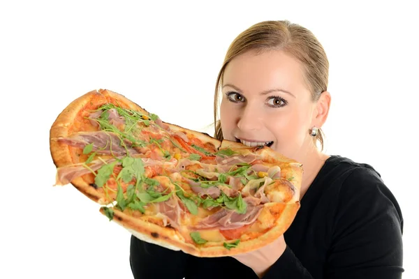 Portret van een jonge vrouw een pizza eten op een witte achtergrond Stockfoto