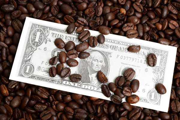 Background of dollar bills and coffee beans — Stock Photo, Image