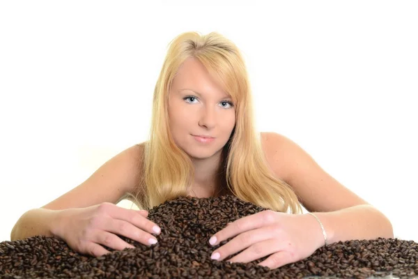 Coffee. Beautiful Girl with Coffee beans Royalty Free Stock Images