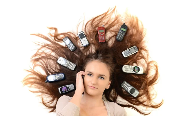 Portret van gelukkig vrouw met mobiele telefoons — Stockfoto