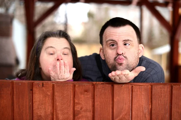 Love couple with down syndrome — Stock Photo, Image