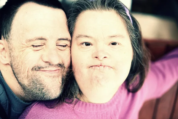 Love couple with down syndrome — Stock Photo, Image