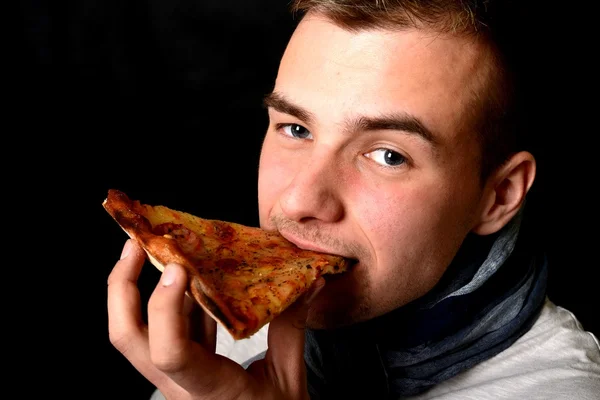 Young Man Eating Pizza — Stock Photo, Image