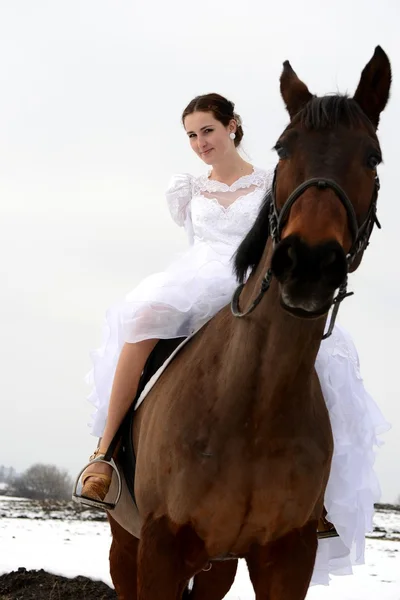 Bride with a horse — Stock Photo, Image