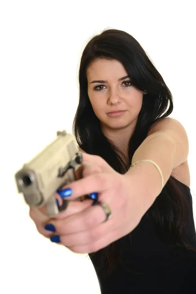 Young beautiful woman with a gun — Stock Photo, Image