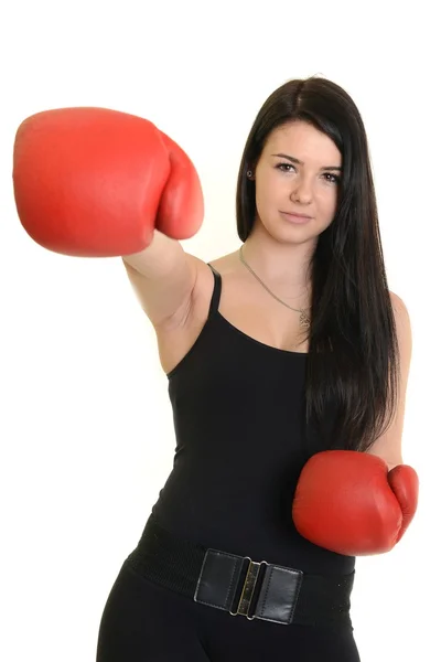 Young beautiful woman with boxing gloves at workout isolated on white — Stock Photo, Image