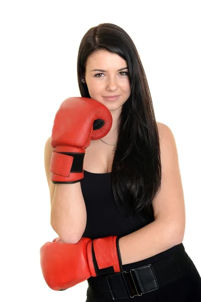 Jovem mulher bonita com luvas de boxe no treino isolado em branco — Fotografia de Stock