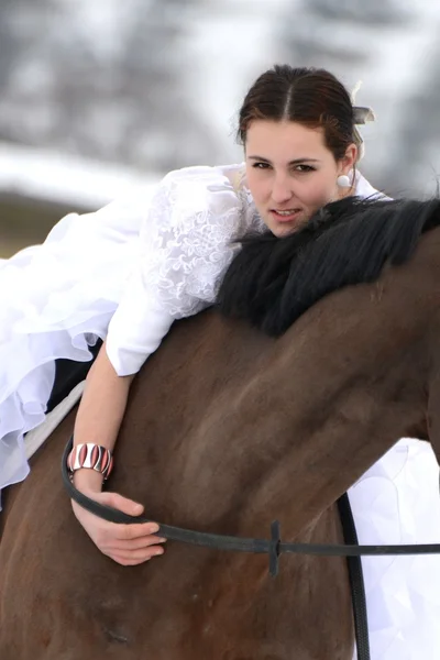 Portrait of a beautiful bride and horse — Stock Photo, Image