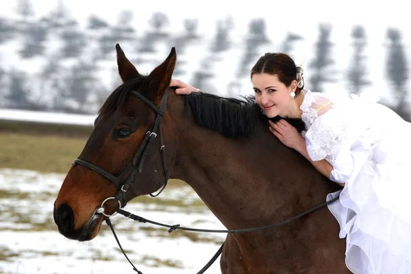 Portrait of a beautiful bride and horse — Stock Photo, Image