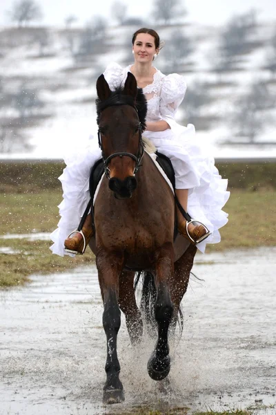 Portrait of a beautiful bride and horse — Stock Photo, Image