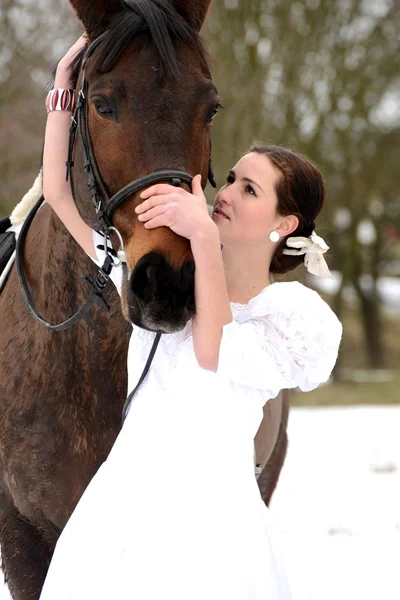 Portrait of a beautiful bride and horse — Stock Photo, Image