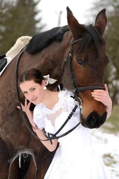 Portrait of a beautiful bride and horse — Stock Photo, Image