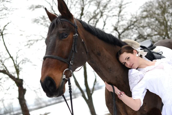 Portrait of a beautiful bride and horse — Stock Photo, Image