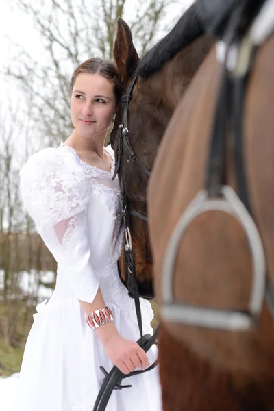 Portrait of a beautiful bride and horse — Stock Photo, Image