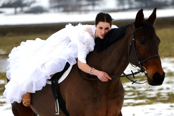 Portrait of a beautiful bride and horse — Stock Photo, Image